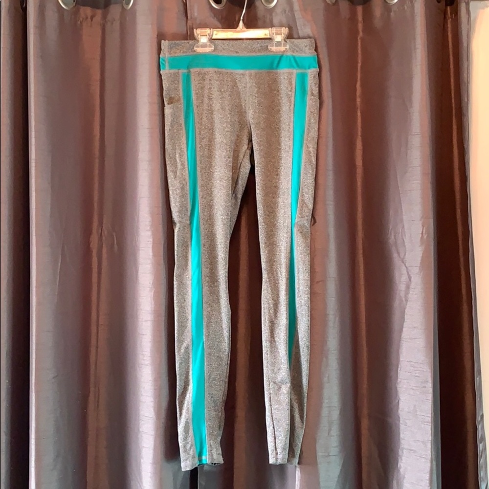 Gray athletic leggings with blue detail